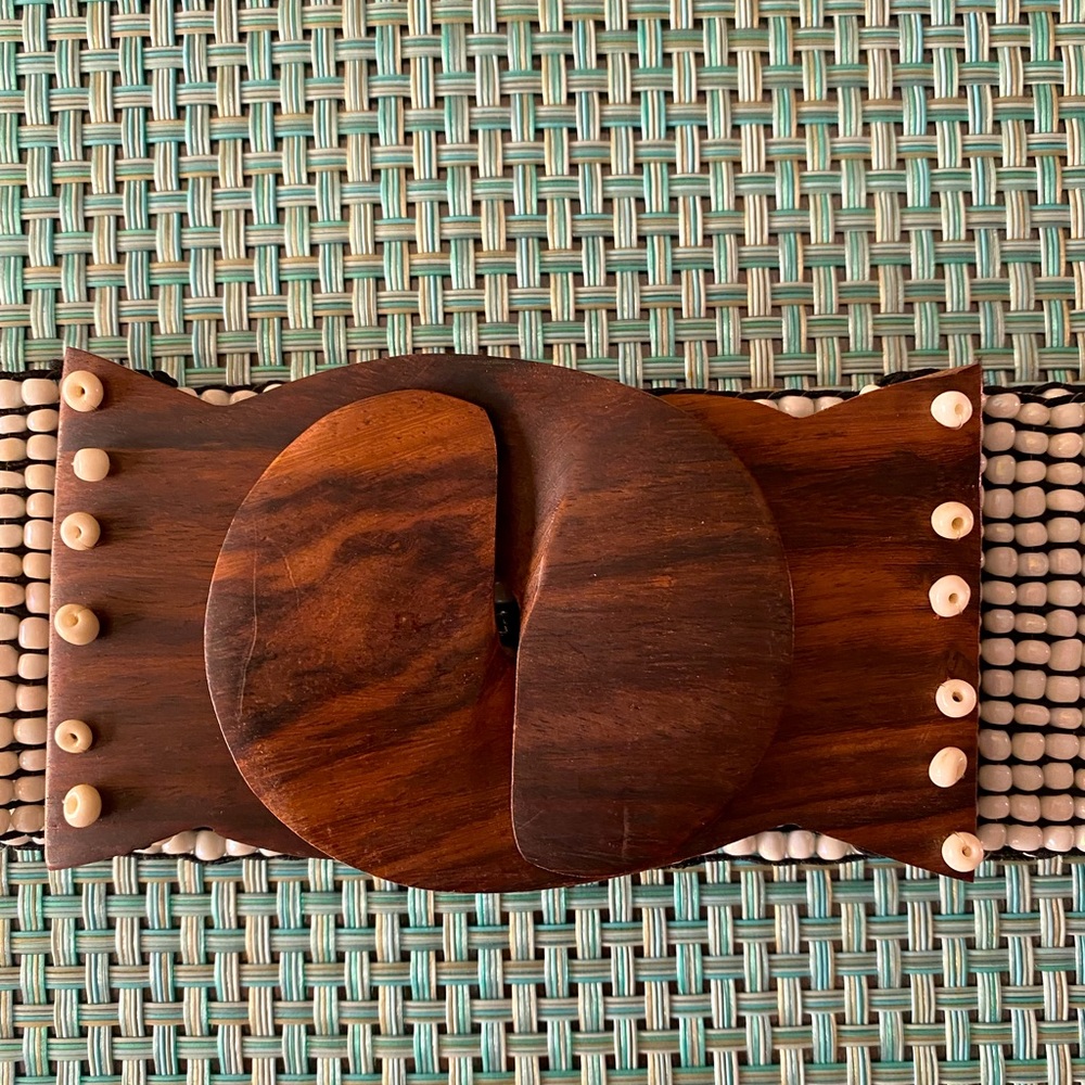 Beautiful beaded belt fits Size M/L Gorgeous neutrals. Carved wood fasteners.